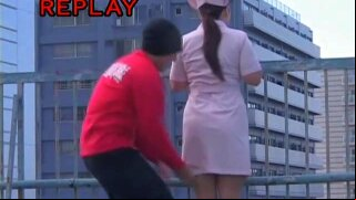 Staying on the balcony and talking to a kinky dude this gentle nurse could not expect he would use the opportunity to shark the bottom of her dress as highly as possible.